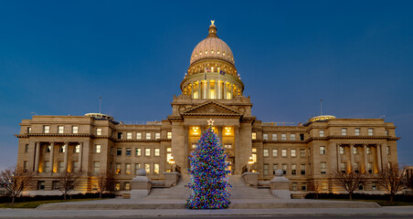 State Capital at night with colorful Christmas tree
