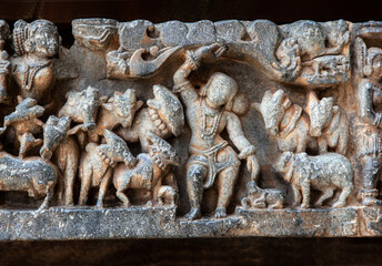 Sculpture of Govardhan Krishna at Hoyasaleshwar temple at Halebidu, Karnataka, India.