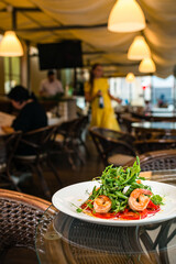 salad with shrimp and white wine in the restaurant