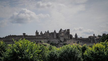 Fototapeta na wymiar Carcassonne, a hilltop town in southern France’s Languedoc area, is famous for its medieval citadel, La Cité, with numerous watchtowers and double-walled fortifications. 