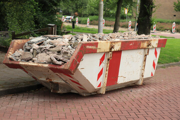 Loaded garbage dumpster