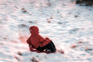 boy sledding