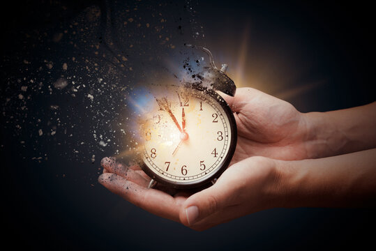 Concept of passing away, the clock breaks down into pieces