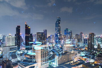 Information flow hologram, night panorama city view of Bangkok. The largest technological center in Southeast Asia. The concept of programming science. Double exposure.