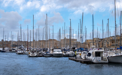Anchorage of yachts and ships off the coast of the town of Birgu. Water space of Valletta. Malta.