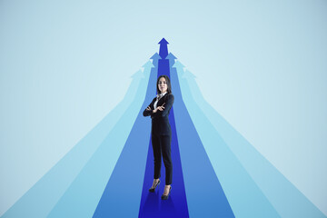 Attractive young european businesswoman with blue arrows on light background. Way, direction and success concept.