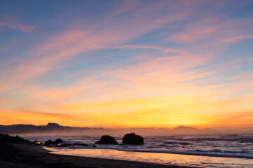 Sunset on a beach in Biarritz. Winter time.