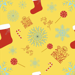 seamless christmas pattern on yellow background sock snowflakes lollipops gift