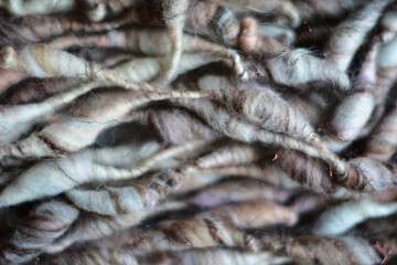 background photo of textured handspun art yarn