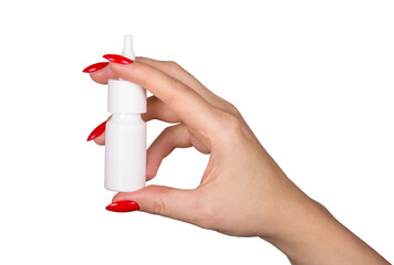 Nasal spray in hand on white background