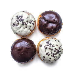 Donuts with chocolate and vanilla icing for dessert