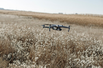 Fototapeta na wymiar close up photo of flying drone with digital camera