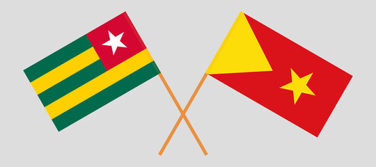 Crossed flags of Togo and Tigray. Official colors. Correct proportion