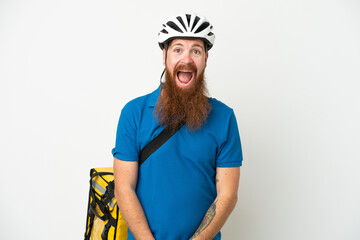 Young reddish caucasian man with thermal backpack isolate don white background with surprise facial expression