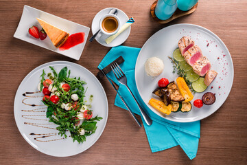 Food. Set of dishes on the table. On a wooden background. Top view. Copy space.