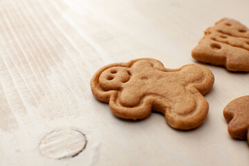 christmas shaped cookies isolated on white wooden background