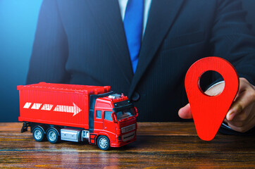 Businessman sets destination of cargo transportation. Transport service infrastructure. Logistics....
