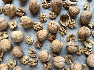 close up of walnuts in shells d seeds top view
