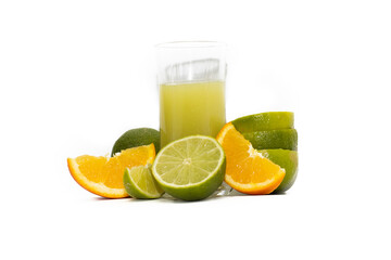 Glass of lime juice and sliced lime fruits, isolated on white background.