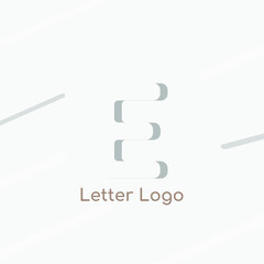 Elegant letter E logo as negative space icon creative