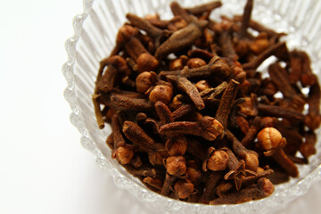 Cloves are the aromatic flower buds of a tree in the family Myrtaceae, Syzygium aromaticum.