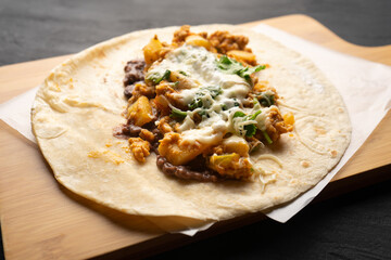 Picadillo burrito with beans and cheese. Mexican food
