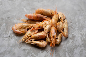 Dried shrimp on a gray background