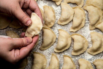 hands sculpt dumplings