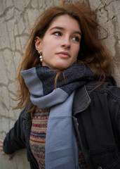 Portrait of a young woman with dark red hair