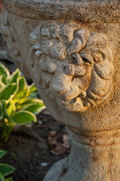 Lion head, antique concrete water fountain.