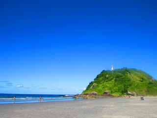 Fototapeta premium lighthouse on the coast with beach