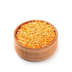 Red lentils in a wooden cup. White background