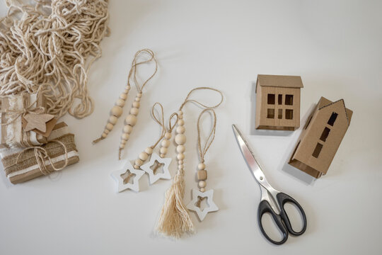 Wooden Christmas decorations, reusable sustainable recycled paper gift wrapping alternative zero waste concept