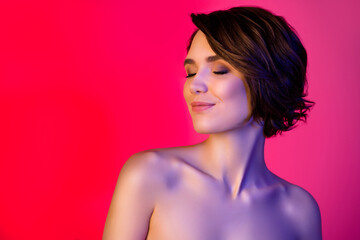 Profile photo of cool short hairdo young lady without clothes closed eyes isolated on vibrant neon red color background