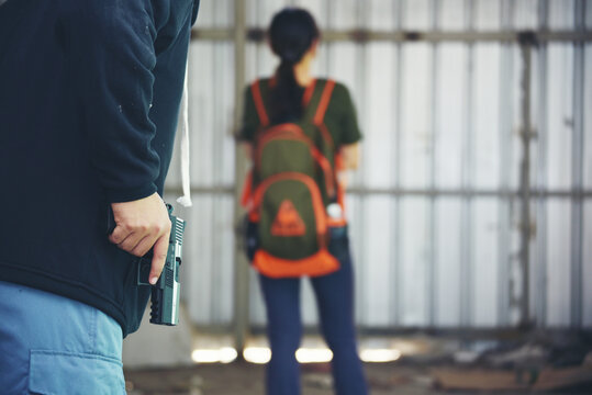 Thief armed man rob woman by gun on street so scared shocked face. Frightened asian woman was rob aggressive by danger bandit man. Robbery thief using gun burglar. Criminal aggression crime concept.