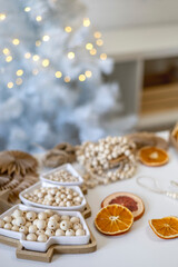 Wooden Christmas decorations, reusable sustainable recycled paper gift wrapping alternative zero waste concept