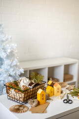DIY Christmas gift making in a metal basket. Fully recyclable holiday decor.