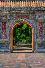Fototapeta na wymiar Wonderful view of the “ Gate of Hue Citadel “ to the Imperial City with the Purple Forbidden City within the Citadel in Hue, Vietnam. Imperial Royal Palace of Nguyen dynasty in Hue. Hien Nhon gate