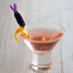 pink/peach cocktail with lavender and orange detail