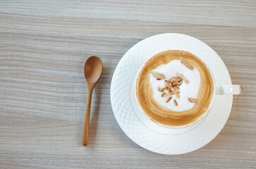   top view a cup of hot coffee on wood background