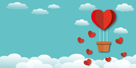 Red hearts with balloon and clouds on blue sky background. Greeting card for Valentine, Wedding, Mother's and Father's day, birthday, poster and postcard, love concept. copy space. paper art design.
