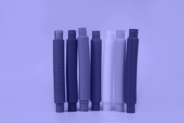 Popit tube of trending color Color Very Peri, blue hues of 2022.