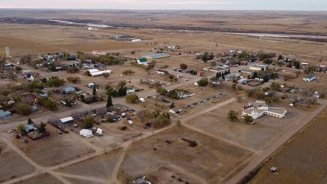 Drone view over head of the town of Empress Alberta Canada during the daytime in the prairies.