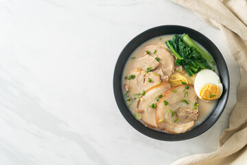 Ramen noodles in pork bone soup with roast pork and egg