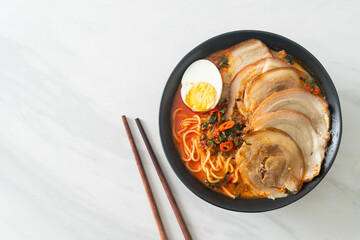 Ramen Noodles Spicy Tomyum Soup with Roast Pork