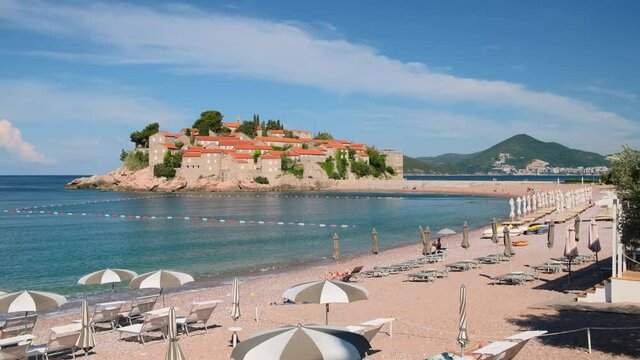 Luxury beach with Sveti Stefan island in Budva at background, Montenegro