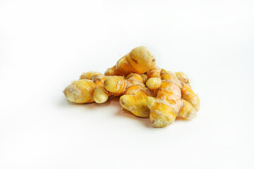 Fresh turmeric on white background,raw material for cooking. Close up.