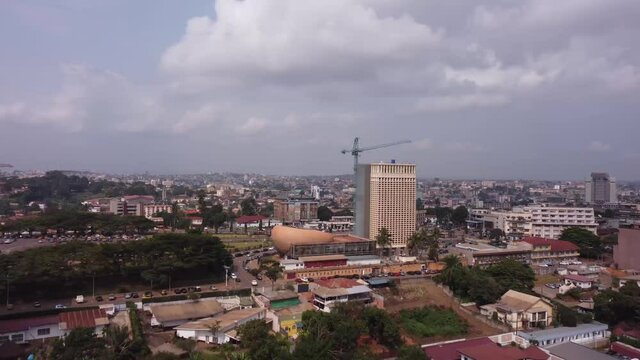 Amazing Rising 4k Shot towards the CNPS in Independence Square, Yaound&eacute; in Cameroon.