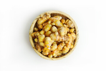 Fresh turmeric on white background,raw material for cooking. Close up.