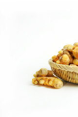 Fresh turmeric on white background,raw material for cooking. Close up.